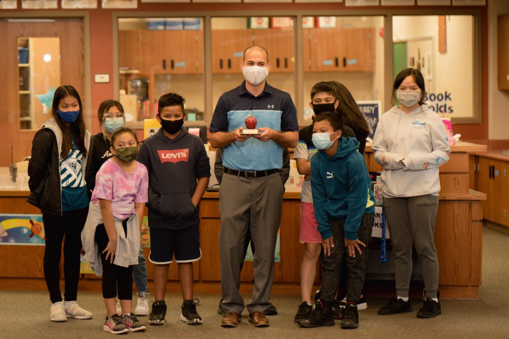 Teacher of the year with class all wearing masks